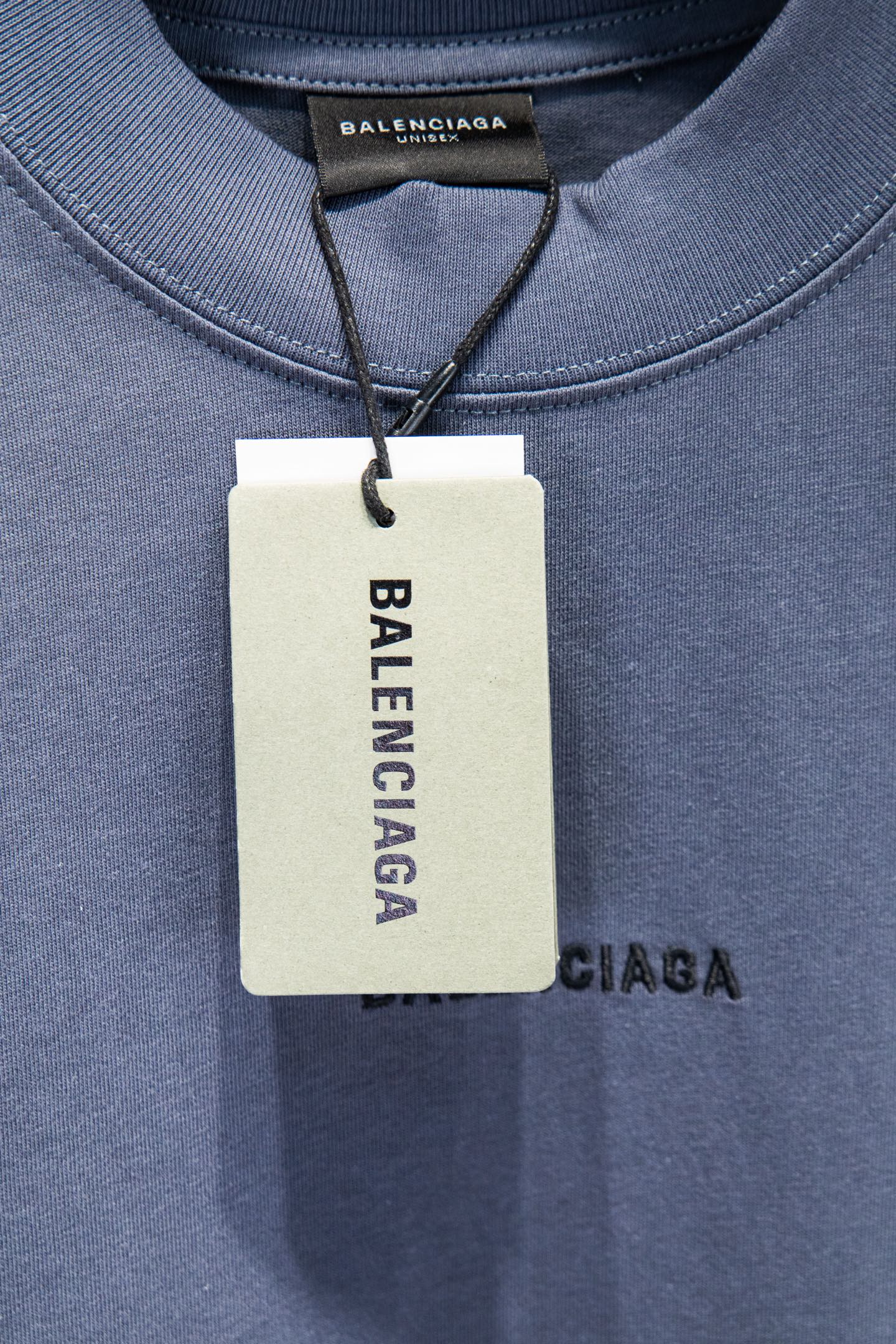 Balenciaga short-sleeve T-shirt with hanging tag at neckline