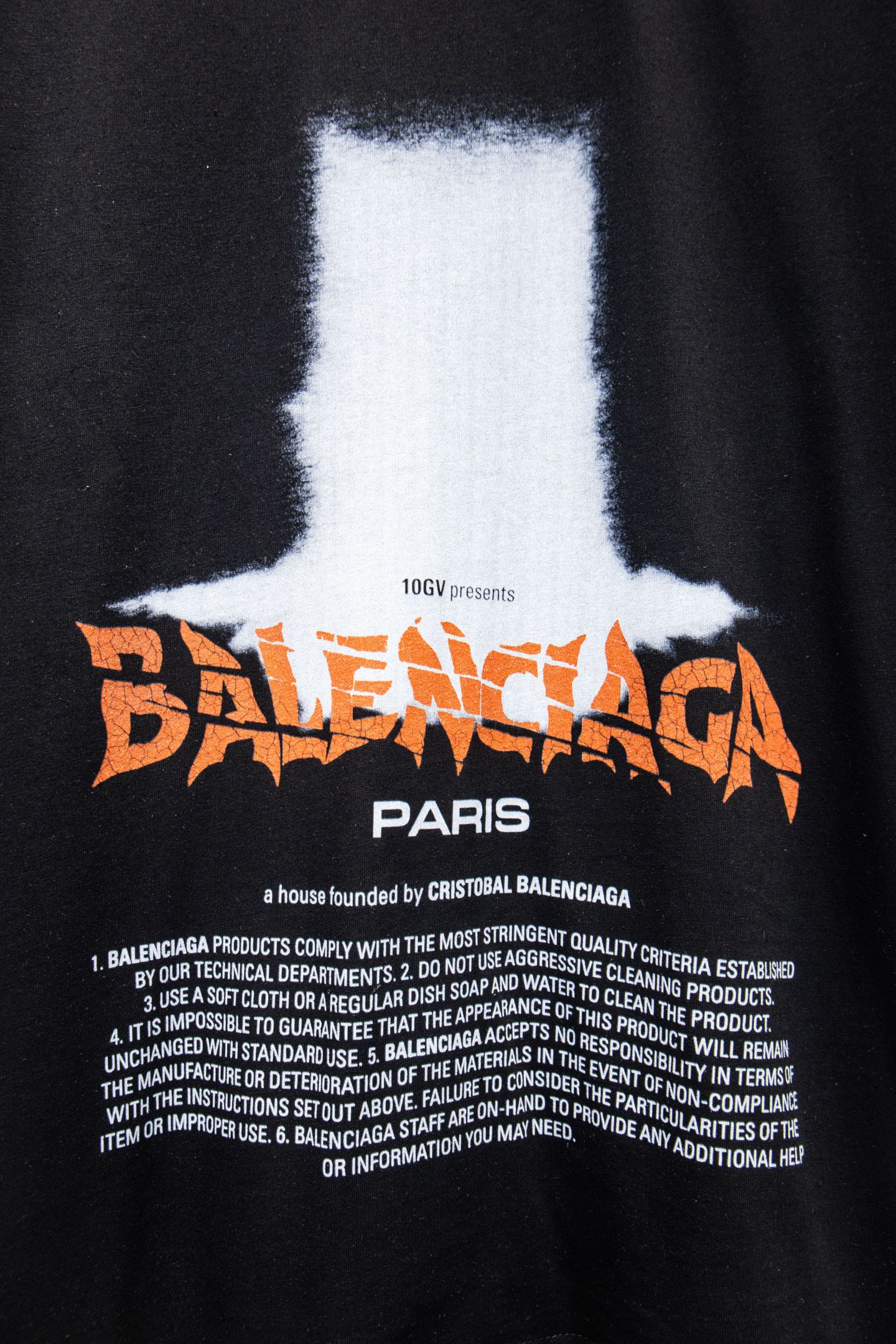 Black short-sleeve T-shirt with colorful logo and PARIS text graphic
