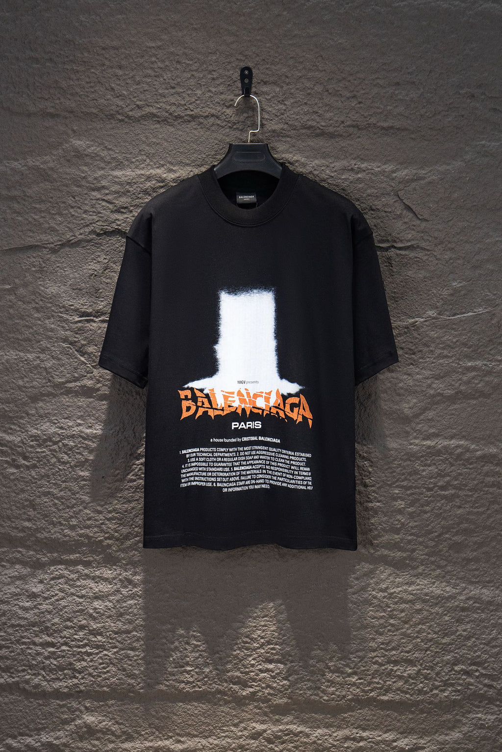 Black short-sleeve T-shirt with large front graphic print