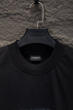 Black short-sleeve T-shirt neckline with inner label