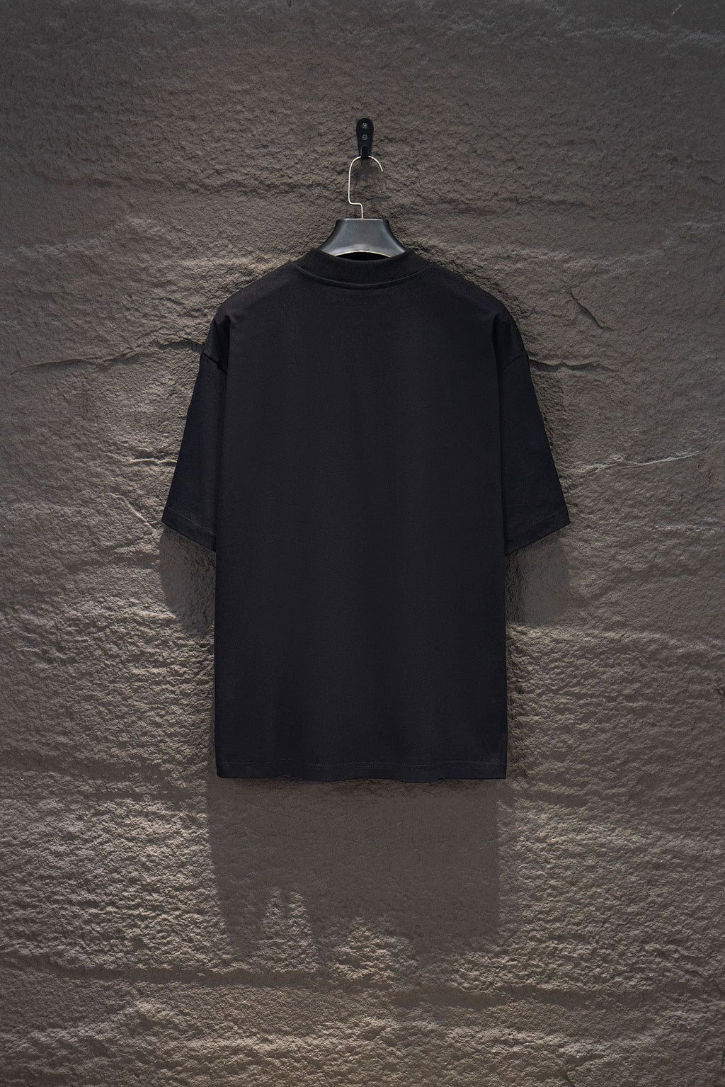 Black short-sleeve T-shirt back view, plain