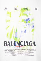 Balenciaga white T-shirt with large BALENCIAGA text and neon green/blue print