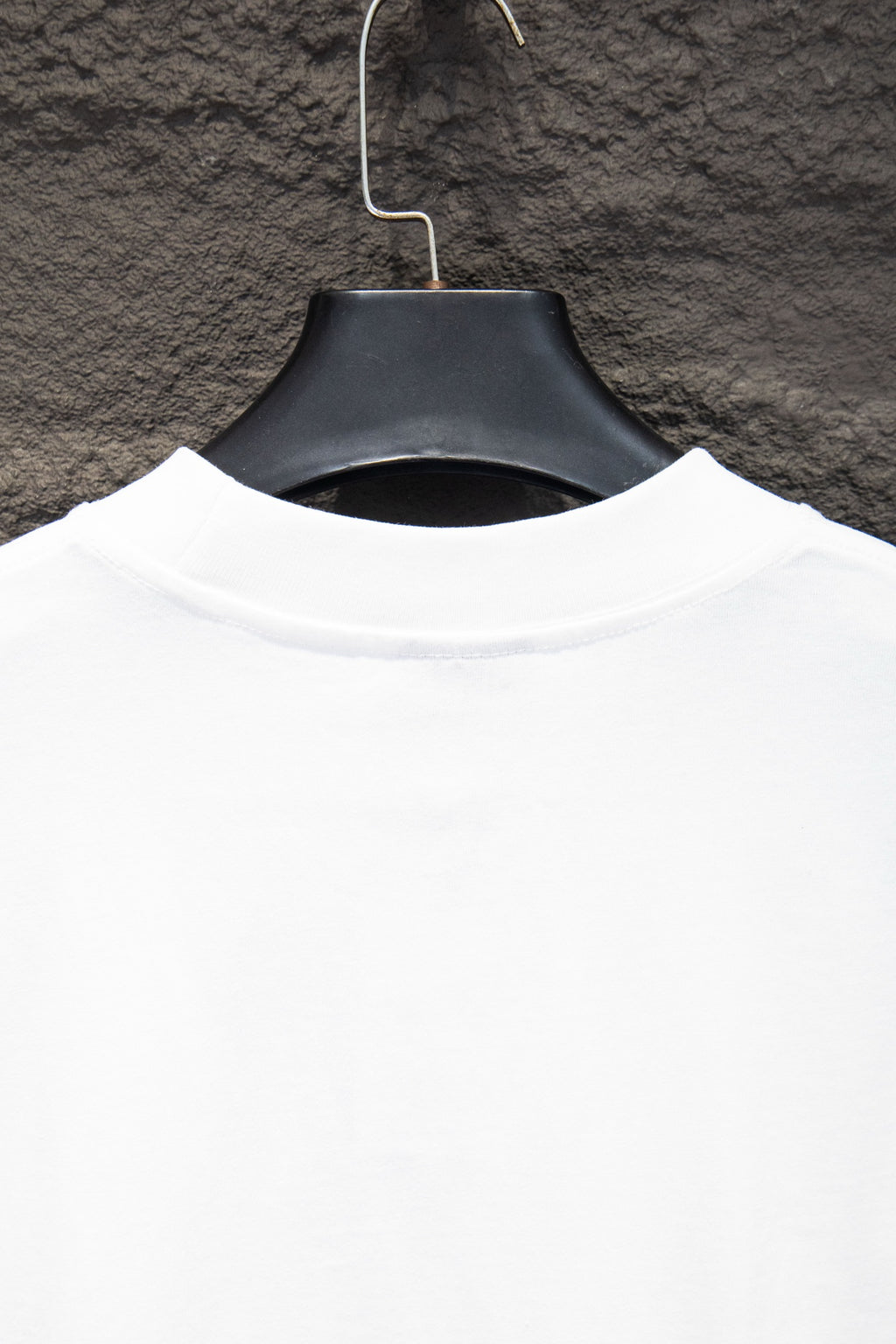 Balenciaga white crewneck T-shirt collar area on hanger