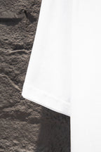 Balenciaga white T-shirt hem, side view