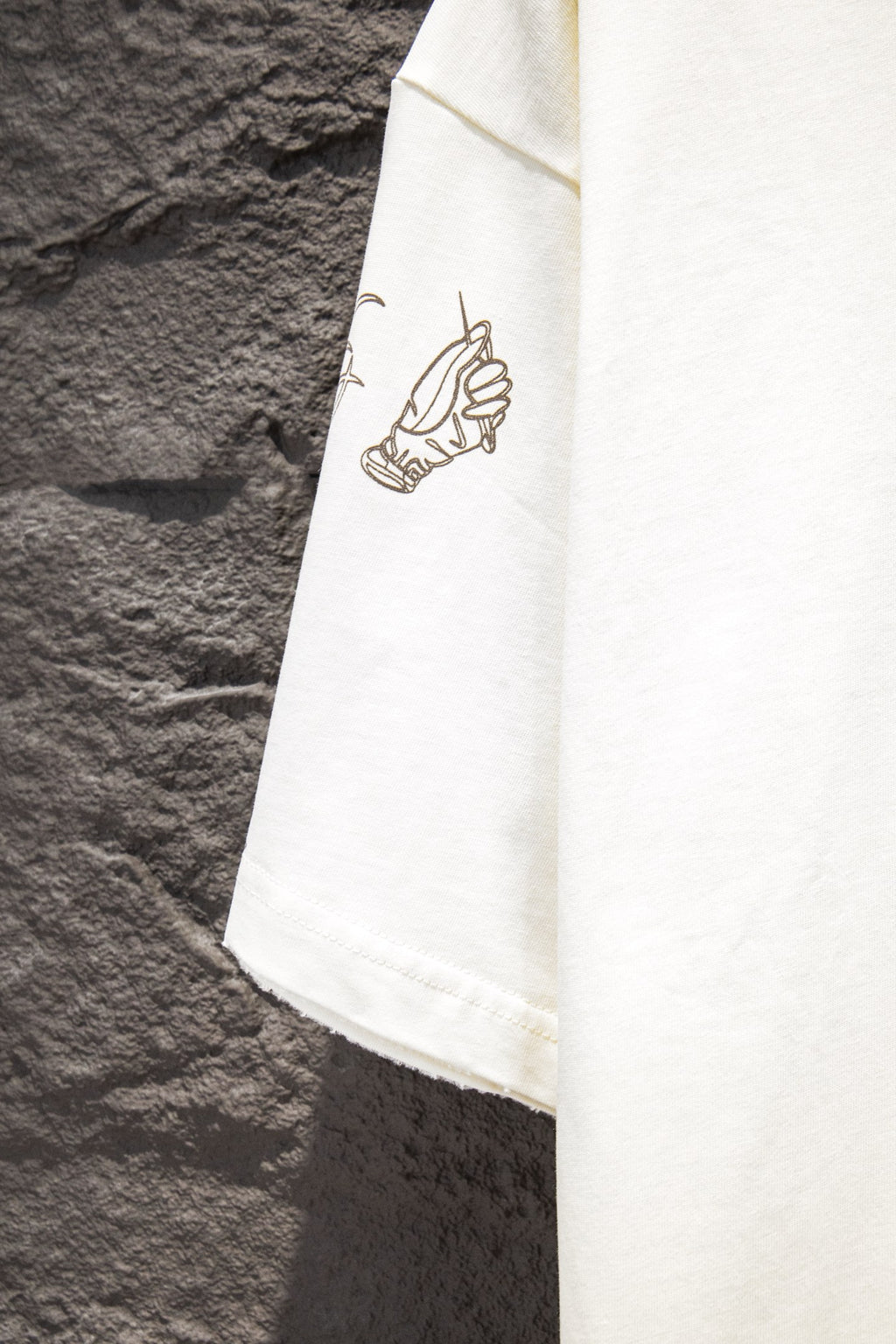 Balenciaga short-sleeve T-shirt sleeve panel, white, small hand graphic near hem