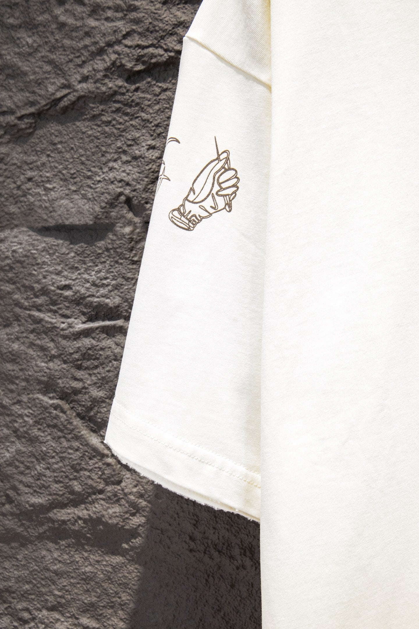 Balenciaga short-sleeve T-shirt sleeve panel, white, small hand graphic near hem