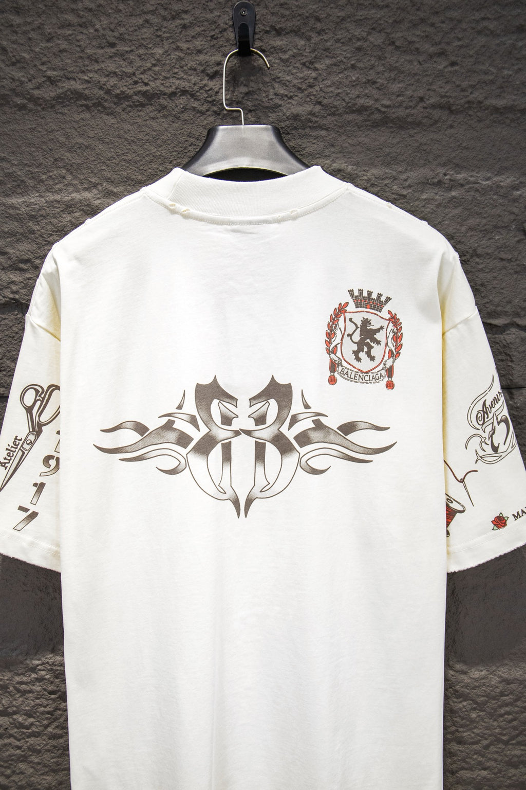 Balenciaga short-sleeve T-shirt, white, back view with large emblem and crest badge