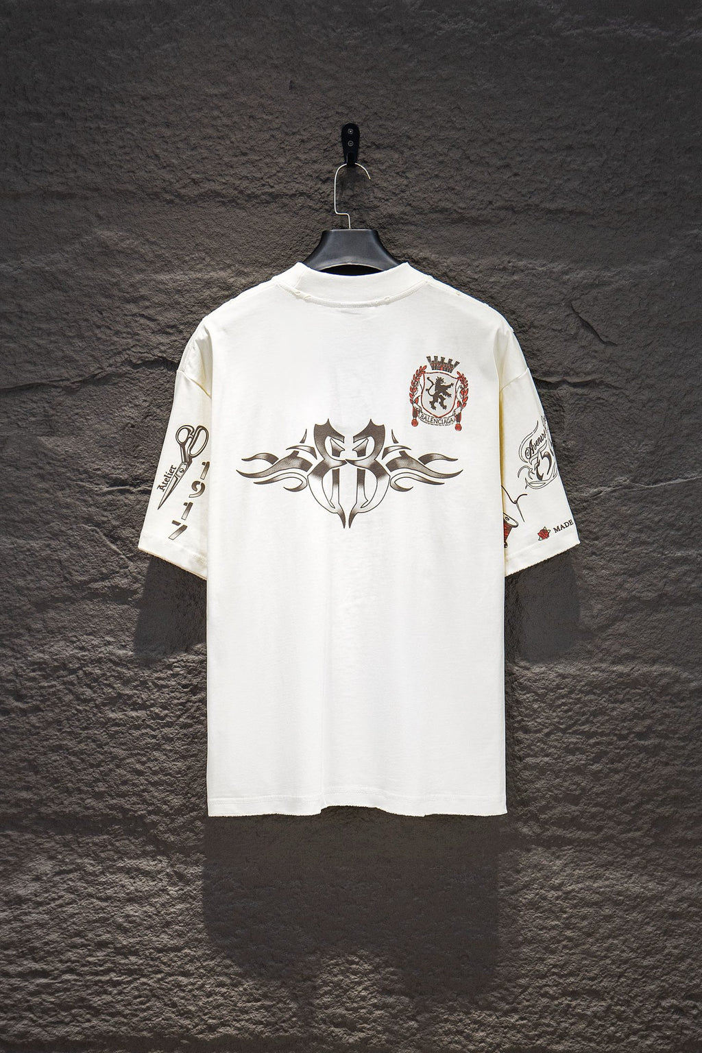 Balenciaga short-sleeve T-shirt, white, back view with large central emblem and crest