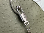 Louis Vuitton olive green bag with engraved padlock charm and D-ring strap