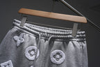 Gray monogram sweat shorts close-up, elastic waistband with drawstring, Louis Vuitton