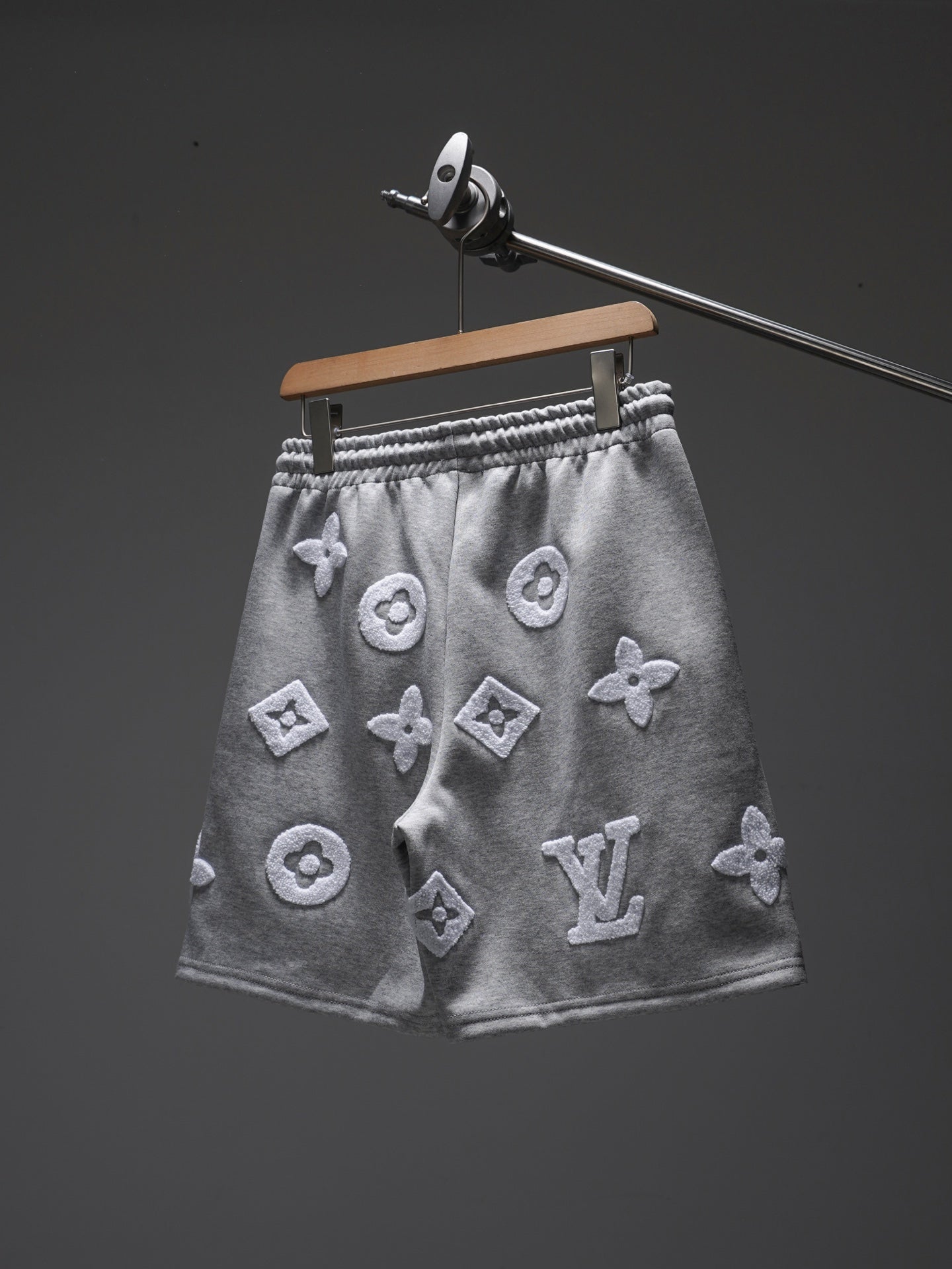 Gray monogram sweat shorts on hanger, elastic waistband and drawstring, Louis Vuitton