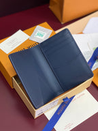 Blue Louis Vuitton small bag interior card slots, open front view