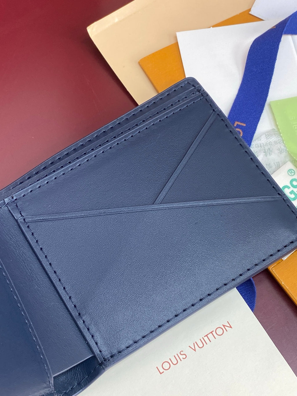 Louis Vuitton small wallet blue leather with stitched card holder panel