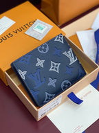 Louis Vuitton small wallet with blue navy monogram print on textured leather