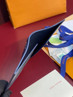 Louis Vuitton small card wallet, dark blue interior view with card slots