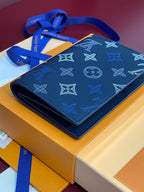Louis Vuitton blue monogram-pattern bag with fold-over flap and strap