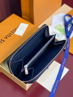 Louis Vuitton blue monogram small zip wallet open view with interior pockets