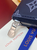 Louis Vuitton blue monogram small zip wallet with silver clasp and zipper pull