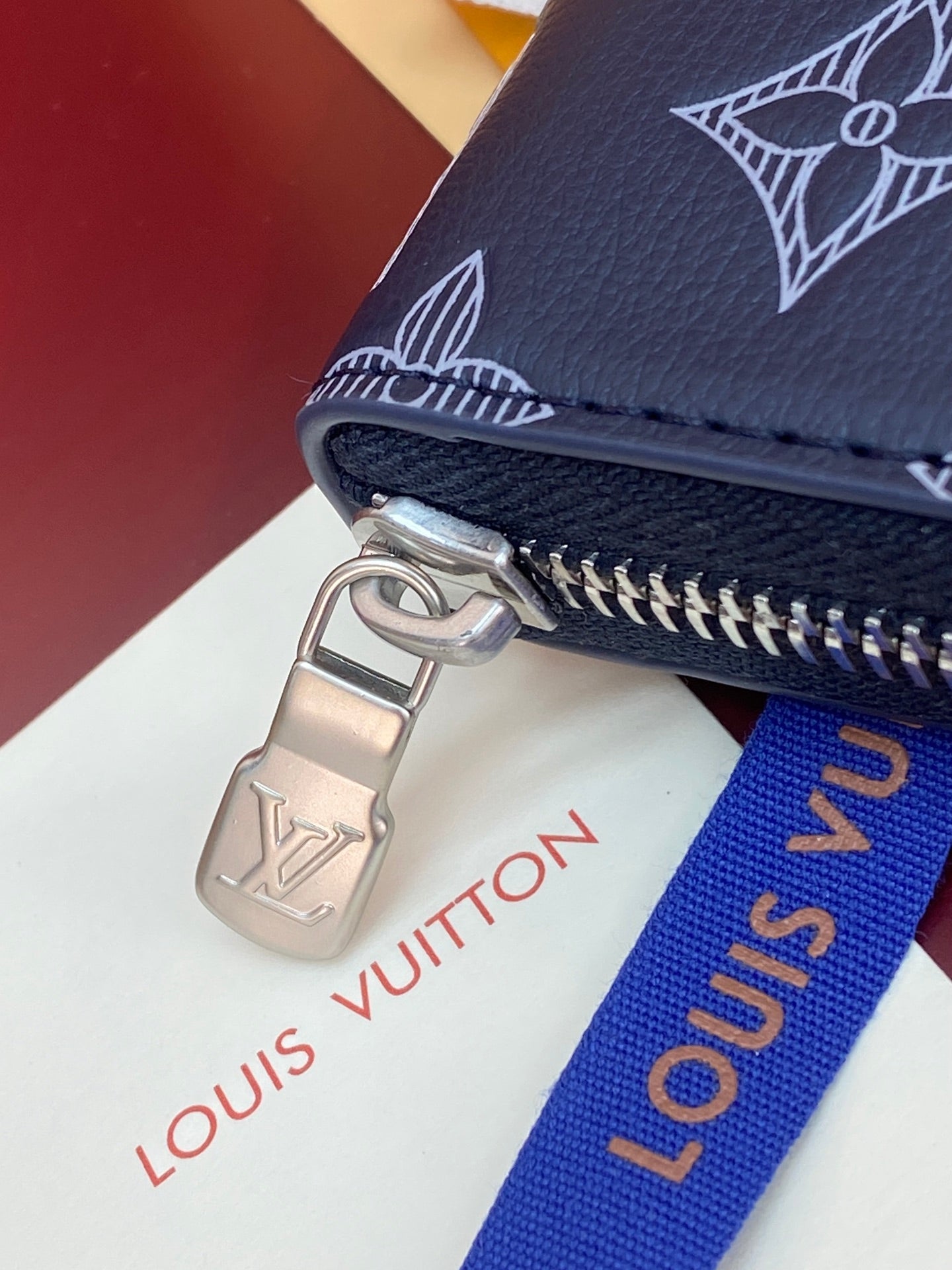 Louis Vuitton blue monogram small zip wallet with silver clasp and zipper pull