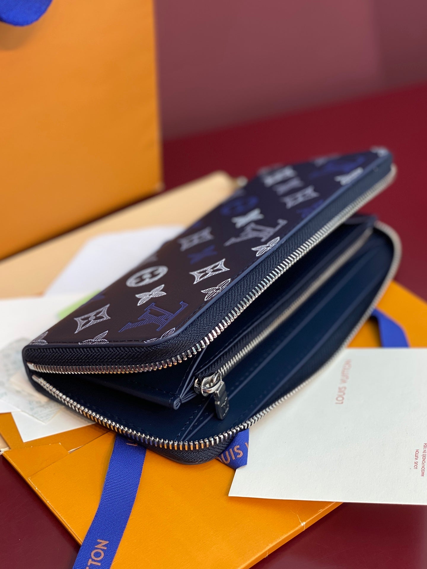 Louis Vuitton blue monogram small zip wallet with silver zipper and tag