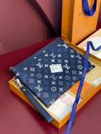 Louis Vuitton navy blue monogram zip pouch with wrist strap and silver hardware