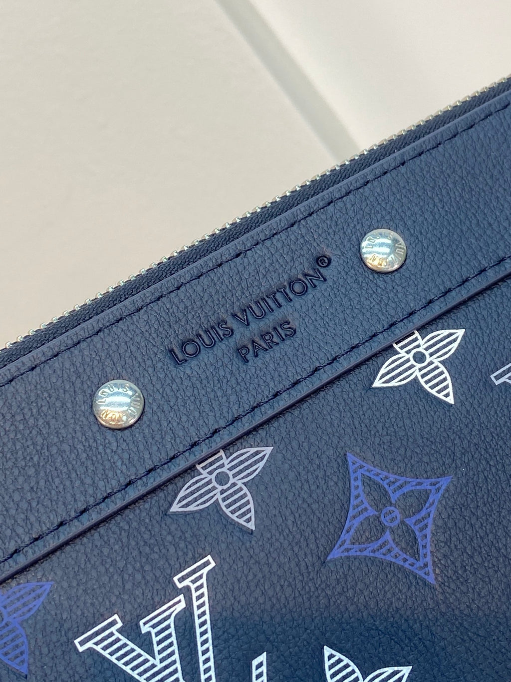 Louis Vuitton navy blue monogram zip pouch with logo plate and snap buttons