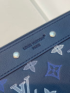 Louis Vuitton navy blue monogram zip pouch with logo plate and snap buttons