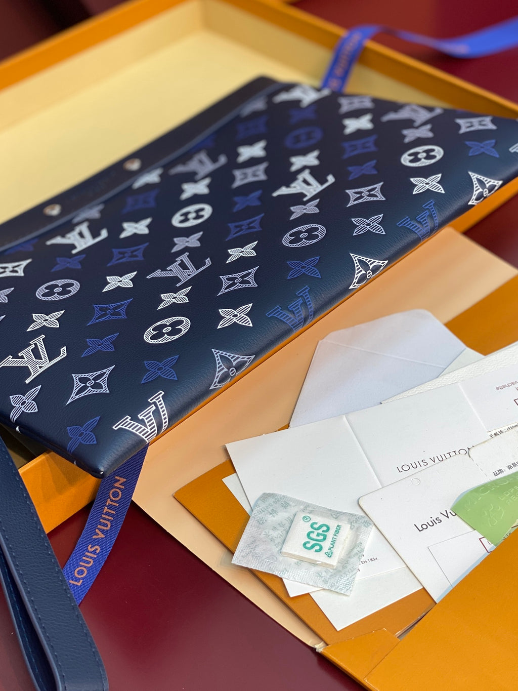 Louis Vuitton navy blue monogram zip pouch with silver zipper pull and studs