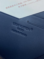 Louis Vuitton bag dark blue leather with embossed 'LOUIS VUITTON PARIS' text
