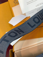 Dark blue Louis Vuitton patterned strap with dotted logo