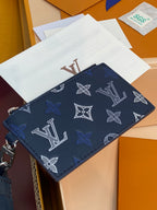 Blue monogram flat pouch with top zipper and silver hardware