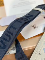 Louis Vuitton small bag: navy jacquard strap with repeating LV pattern and emblem