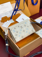 Louis Vuitton small bag with monogram pattern, white leather, blue crossbody strap, zip top