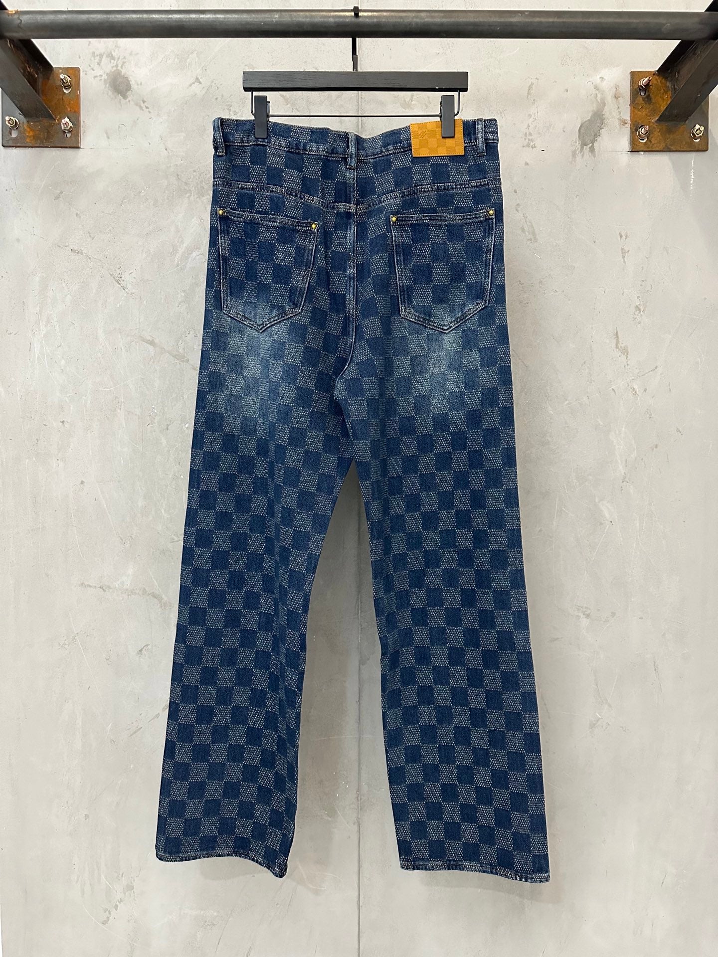 Denim check-pattern pants with belt loops and back pockets, blue wash