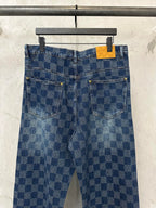 Denim check-pattern pants with front pockets and belt loops, blue wash