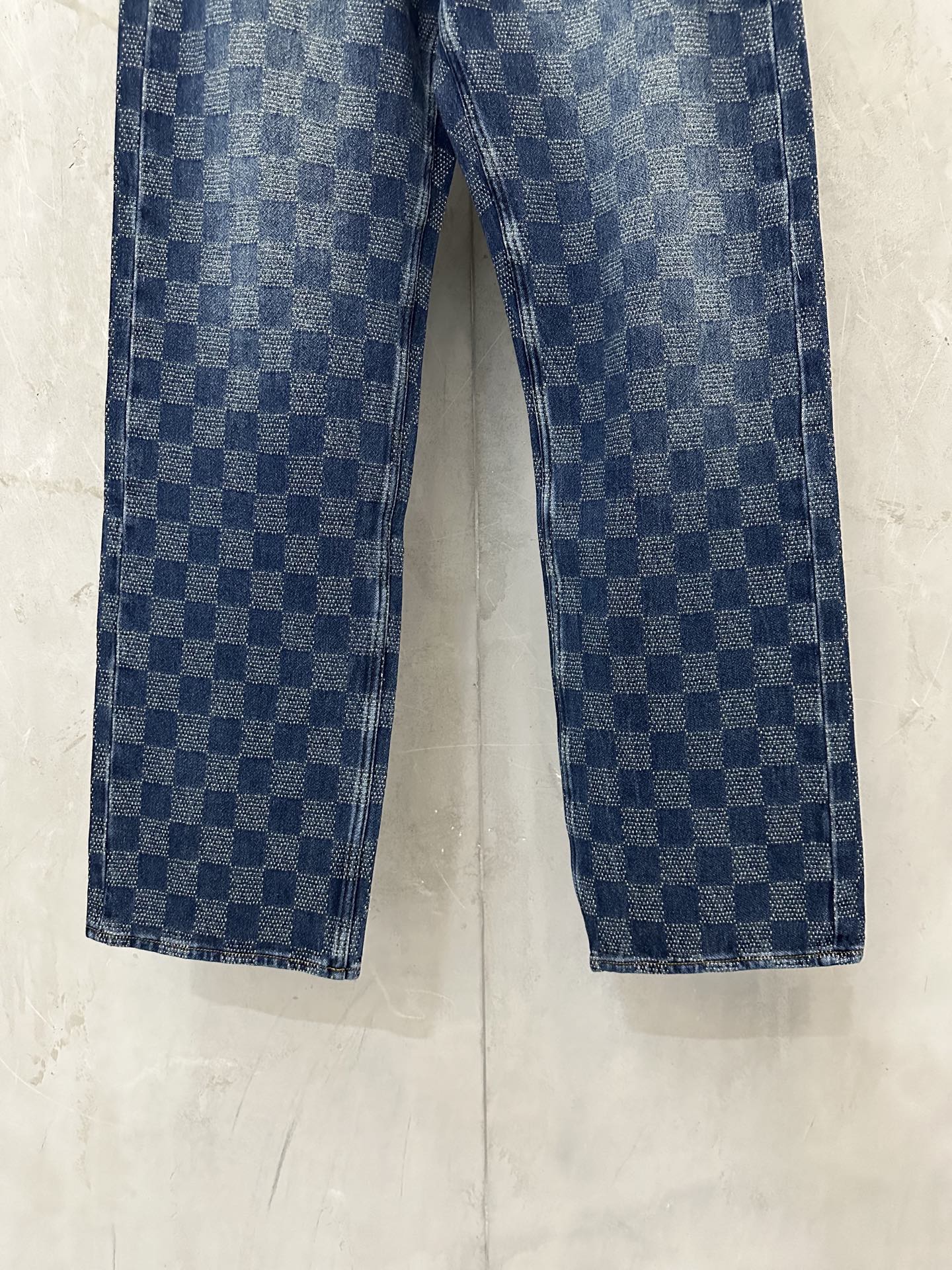 Denim check-pattern pants with straight legs and button fly, blue wash