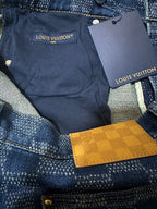 Denim pants interior with brand tag and yellow check pocket detail