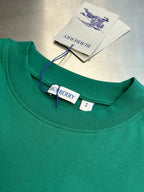 Green crewneck short-sleeve T-shirt with Burberry label and neck tag