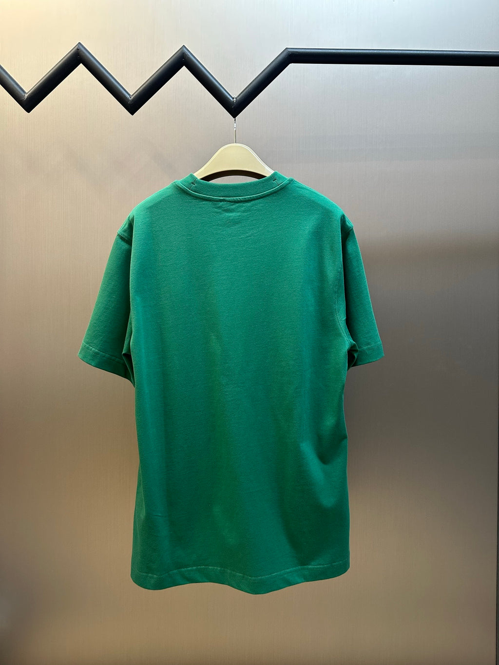 Back view of green short-sleeve T-shirt