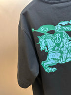 Black short-sleeve T-shirt with teal horse-and-rider graphic detail
