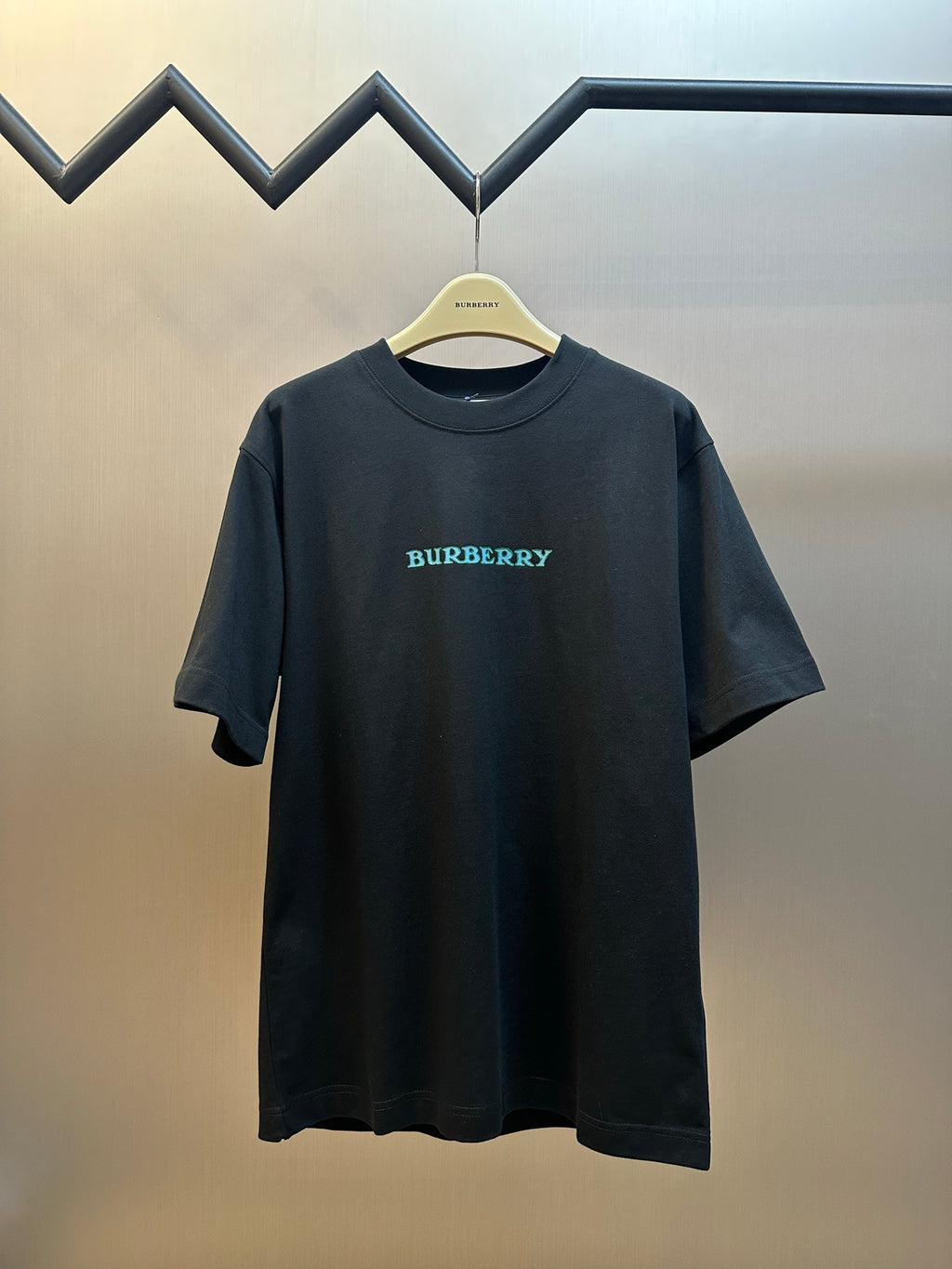 Black short-sleeve T-shirt with small Burberry logo on chest