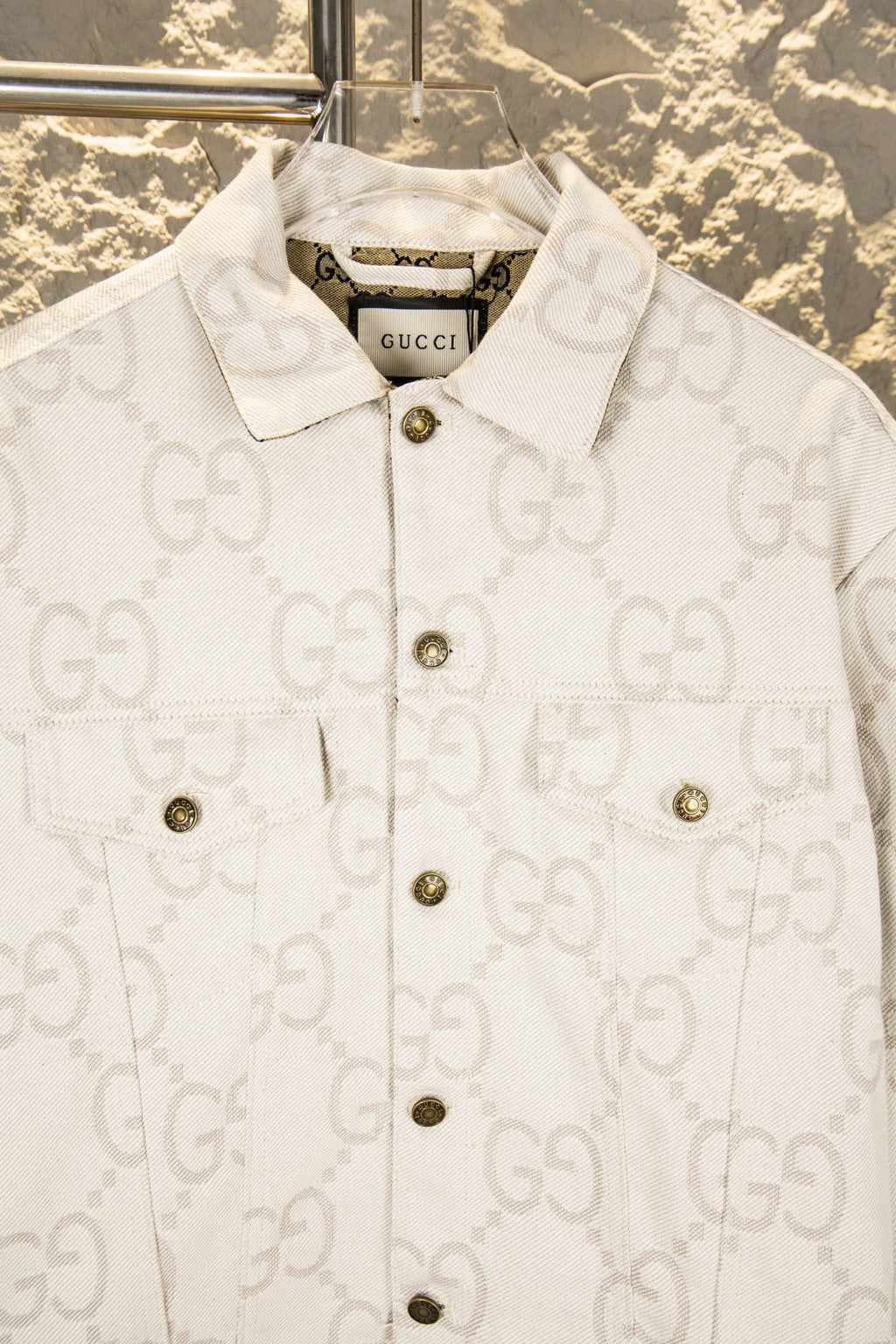 Gucci GG-print white jacket front with gold-tone button placket and logo collar
