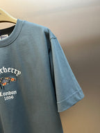 Blue short-sleeve T-shirt sleeve with partial embroidered logo graphic on chest