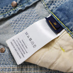 Interior care label inside denim shorts with fabric care icons