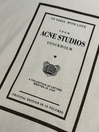 Acne Studios logo graphic on cream T-shirt, framed print