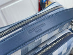 Louis Vuitton check bag detail: blue leather trim with stitched “Louis Vuitton” on zipper