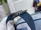 Louis Vuitton check bag strap end with blue leather tab and metal loop connector