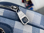 Louis Vuitton check bag zipper pull with “Louis Vuitton” tag and silver-tone hardware