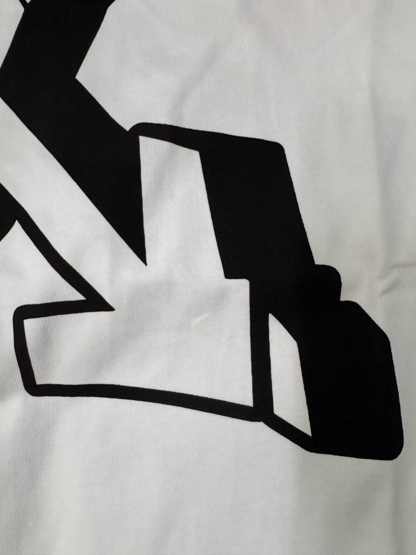 Off White white T-shirt close-up of black logo graphic on front