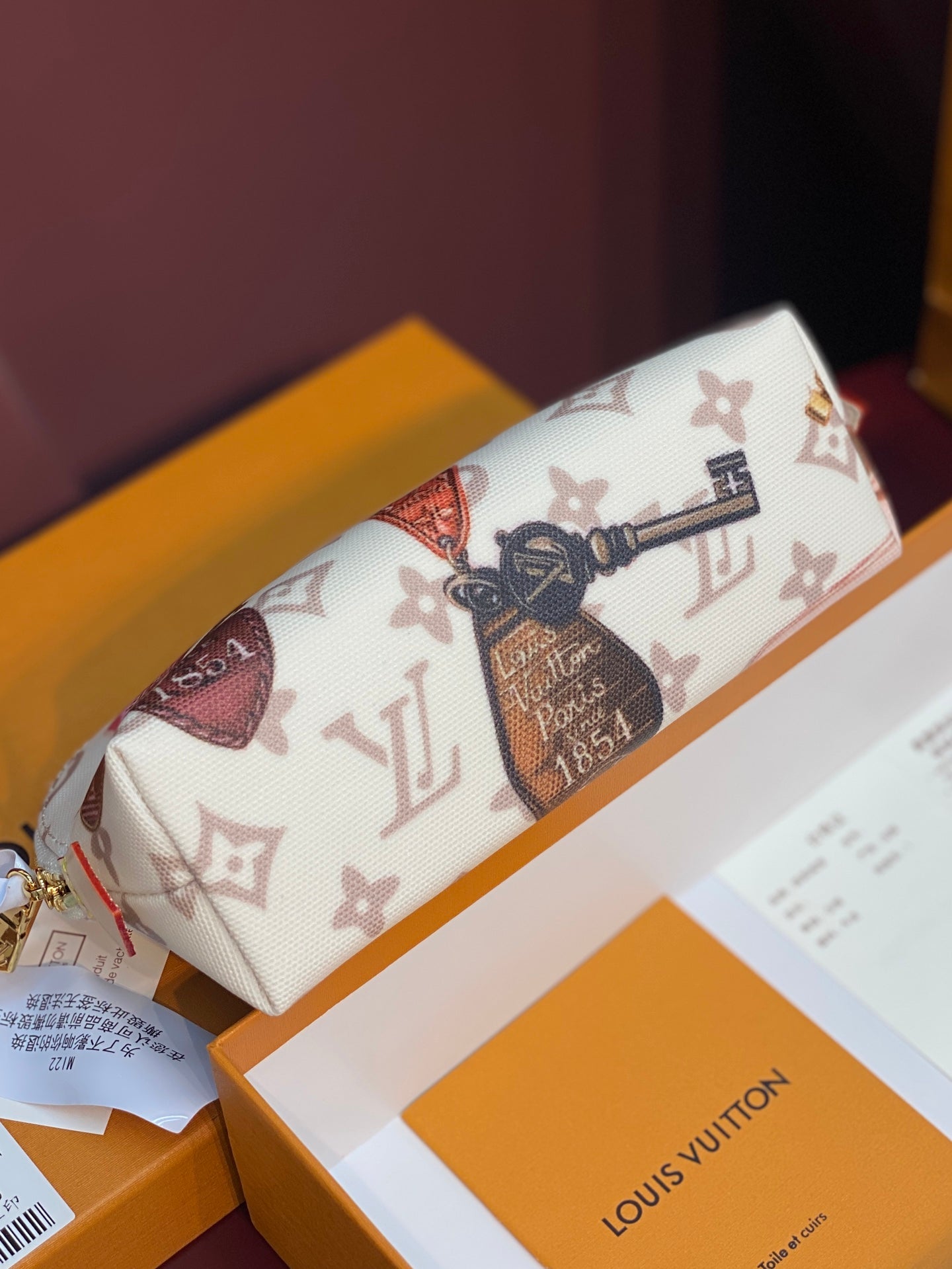 Louis Vuitton multicolor monogram pouch with emblem panel and gold zipper